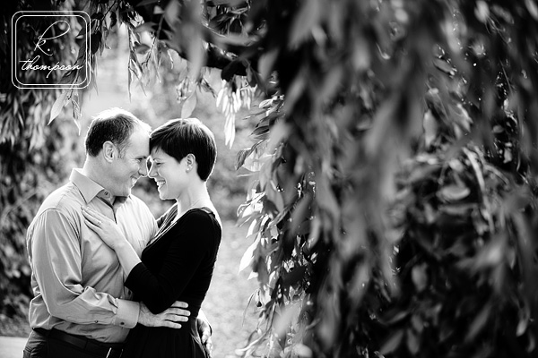 Engaged couple in the gardens behind the Smithsonian Castle in DC